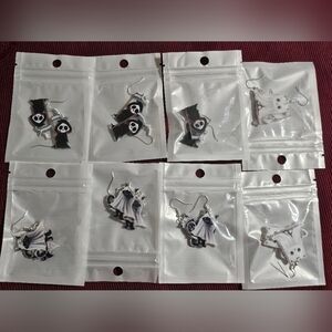 Earrings of Halloween-themed figures